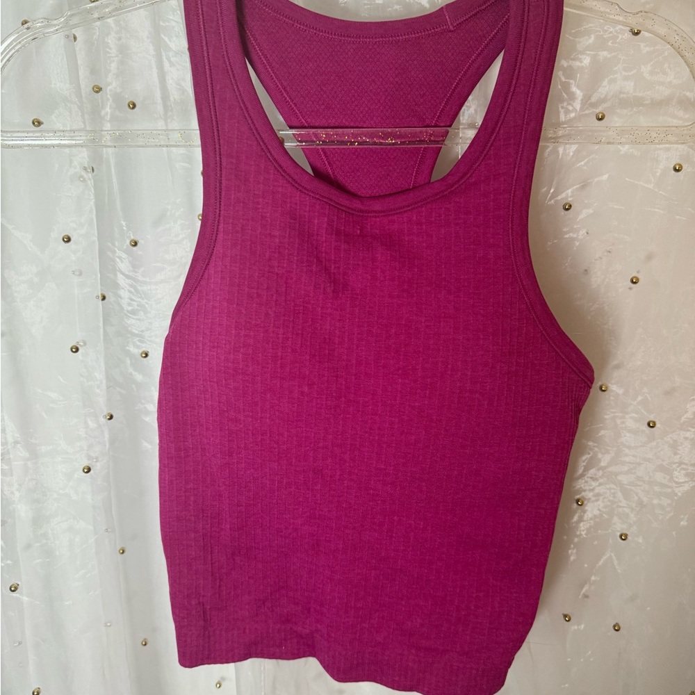Lululemon Ebb To Street Cropped Racerback Tank Top 
size 4 
fushia pink